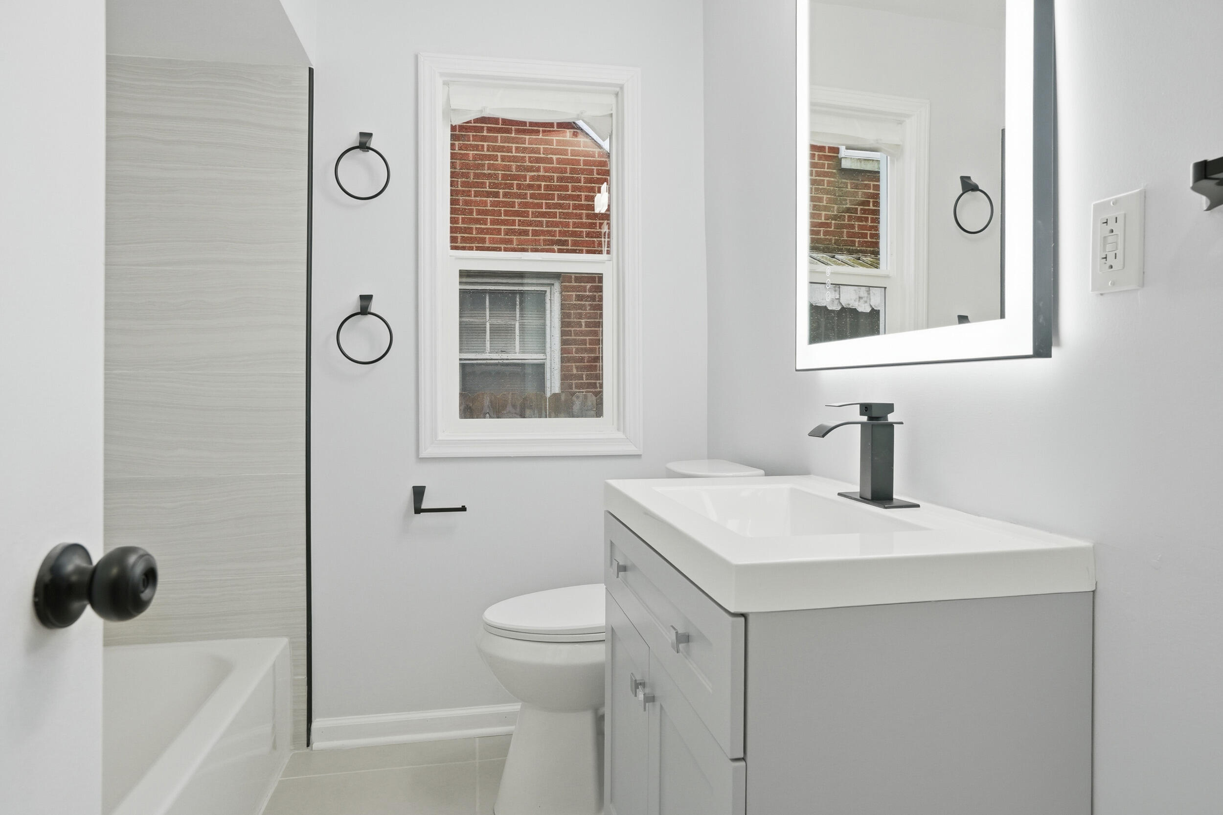 4800 Adams Street Gary, IN 46408 - Photo 15 of 24 a bathroom with a sink and a toilet