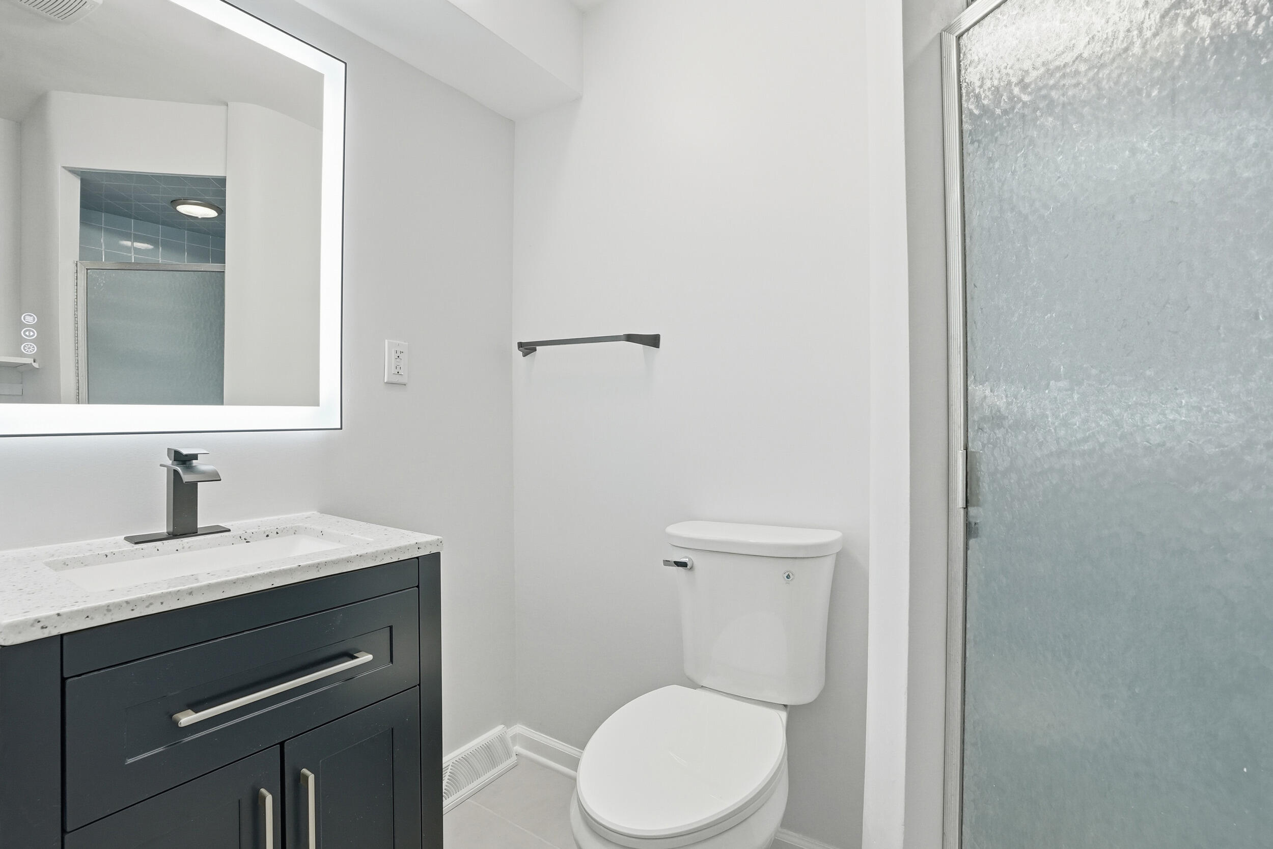 4800 Adams Street Gary, IN 46408 - Photo 16 of 24 a bathroom with a granite countertop toilet sink and mirror