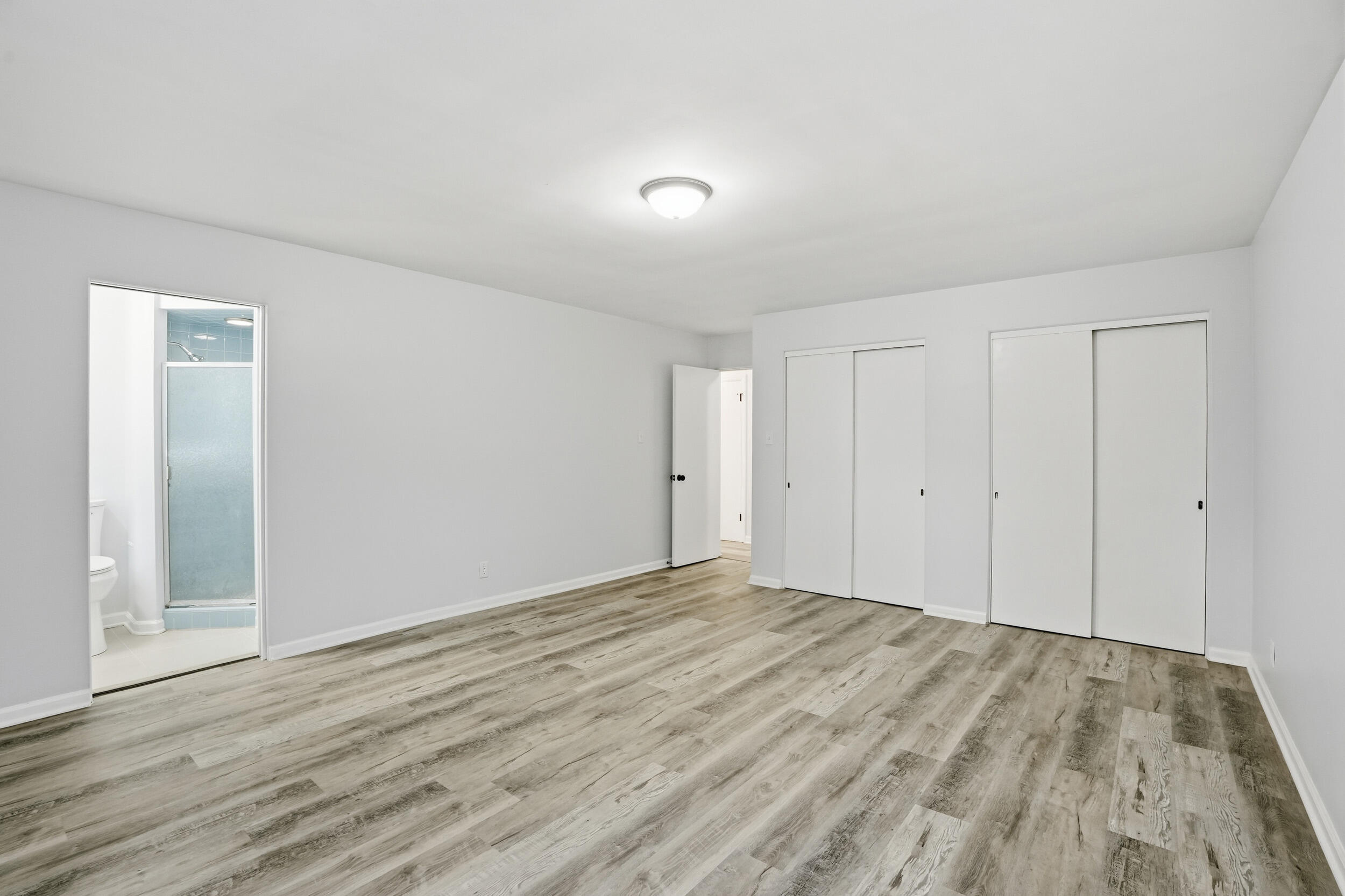 4800 Adams Street Gary, IN 46408 - Photo 8 of 24 a view of an empty room and wooden floor