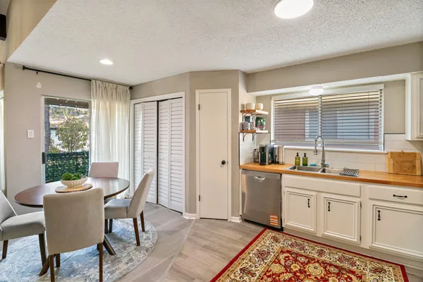a view of a kitchen and dining room