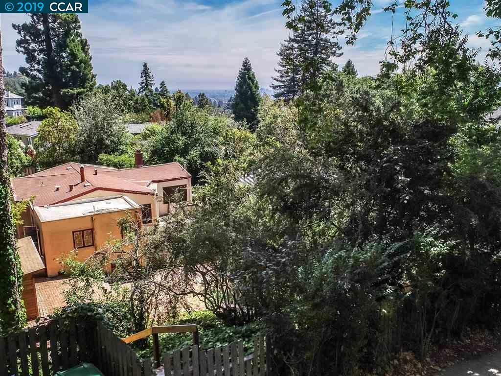 1048 Keith Avenue Berkeley, CA 94708 - Photo 1 of 1 aerial view of a house with a yard and plants