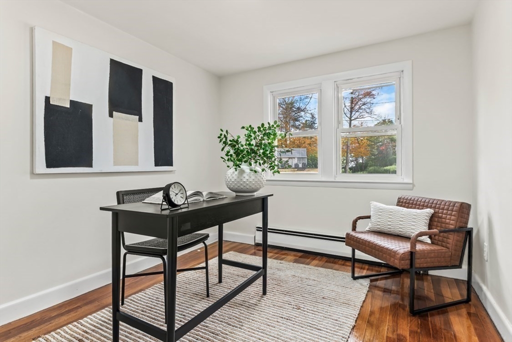 1156 Washington Street Walpole, MA 02081 - Photo 15 of 26 a living room with furniture and a wooden floor