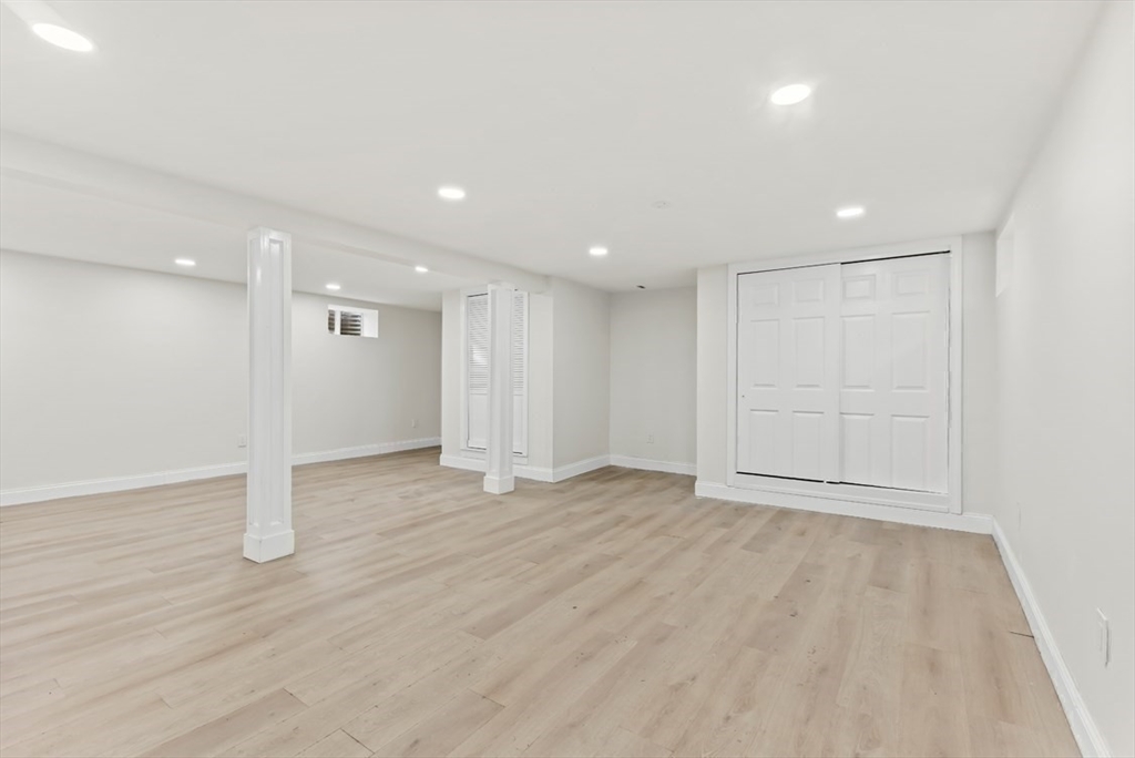 1156 Washington Street Walpole, MA 02081 - Photo 18 of 26 a view of an empty room with wooden floor