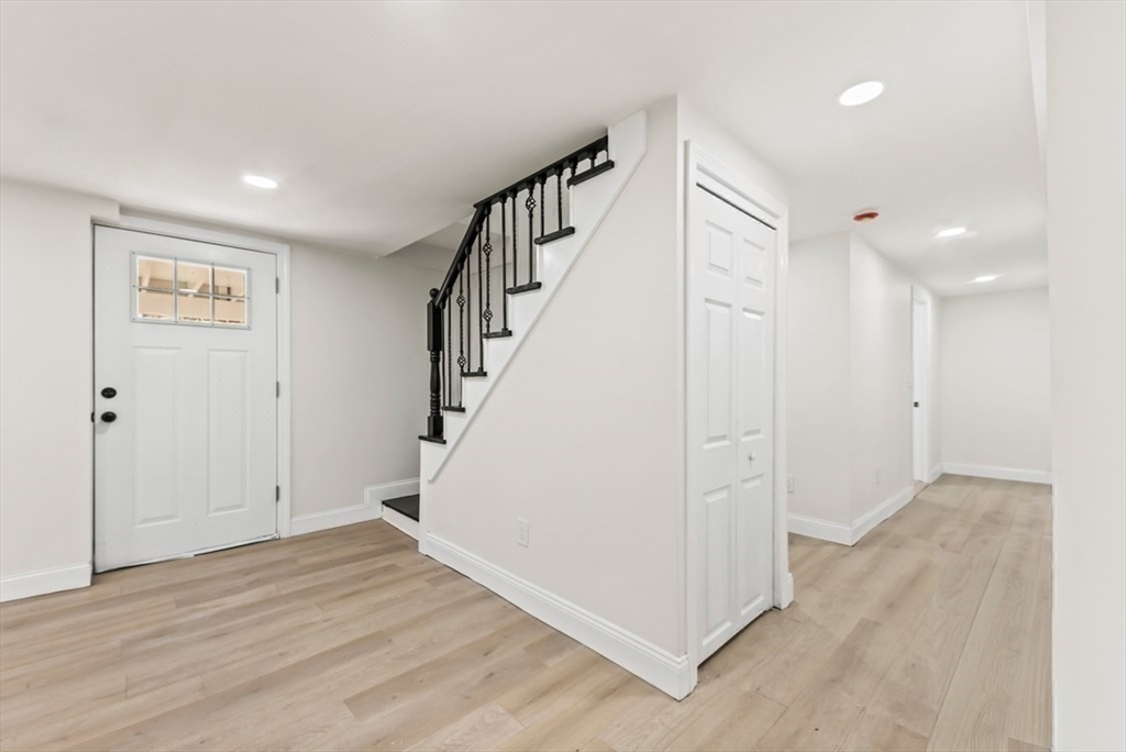 1156 Washington Street Walpole, MA 02081 - Photo 22 of 26 a view of entryway with wooden floor