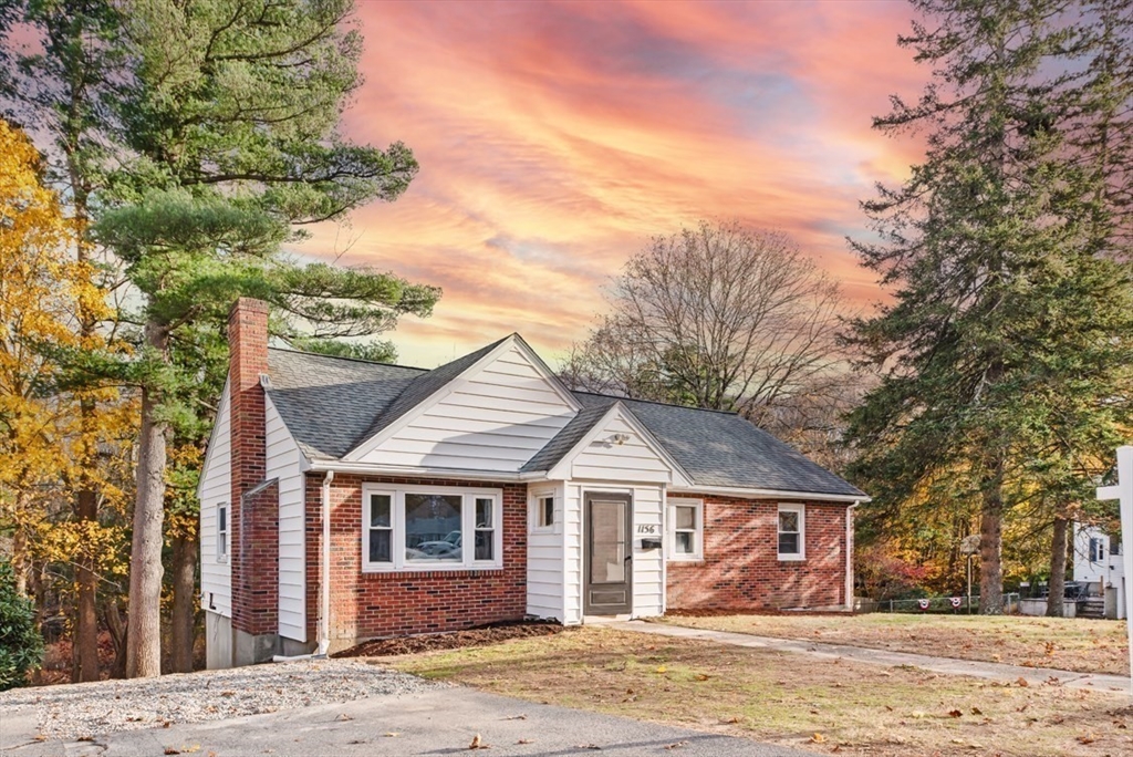 1156 Washington Street Walpole, MA 02081 - Photo 26 of 26 front view of a house with a yard