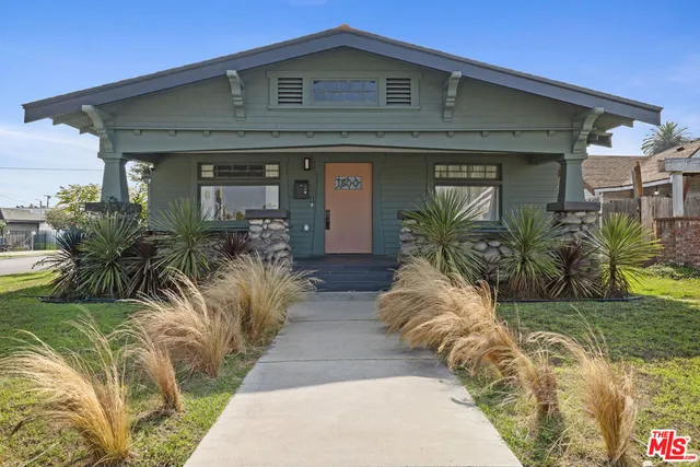a view of house with outdoor space