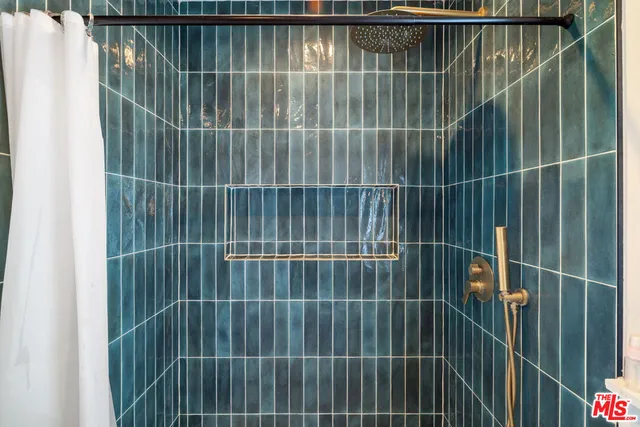 a view of a balcony with a bathroom view