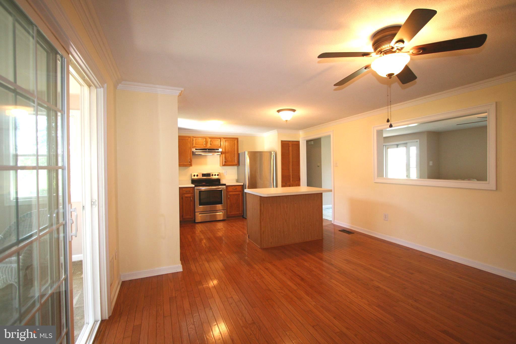 1305 Garrett Road Chester, MD 21619 - Photo 14 of 54 Dining room & kitchen w/ newer solid oak floors.