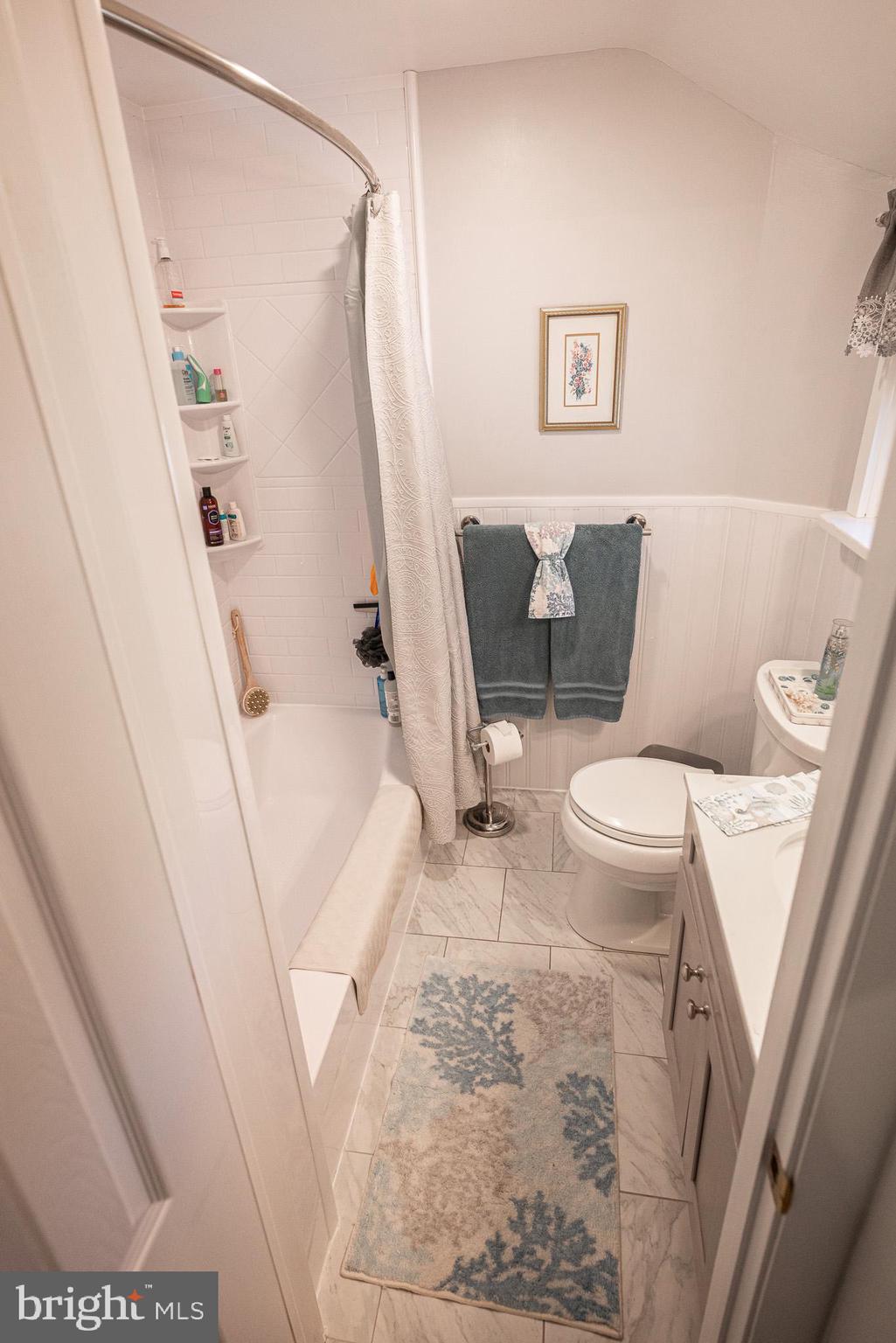 320 Valley View Road Media, PA 19063 - Photo 16 of 34 a white toilet sitting next to a bath tub