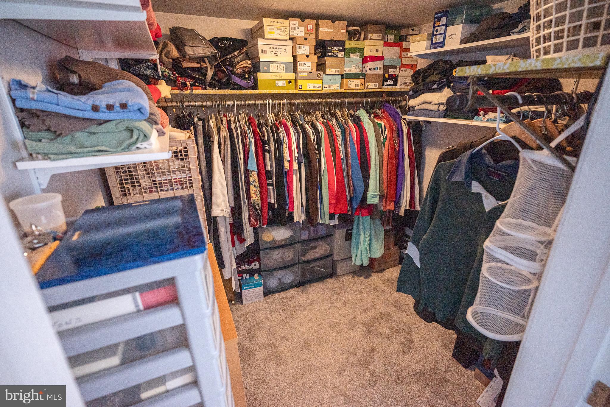 320 Valley View Road Media, PA 19063 - Photo 21 of 34 a view of walk in closet with clothes and shoes