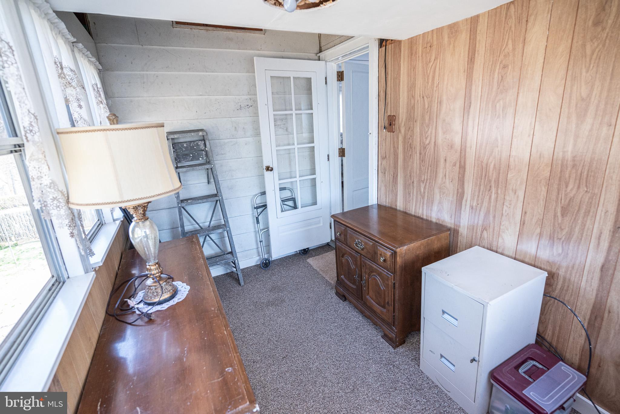 320 Valley View Road Media, PA 19063 - Photo 23 of 34 a living room with furniture and a table