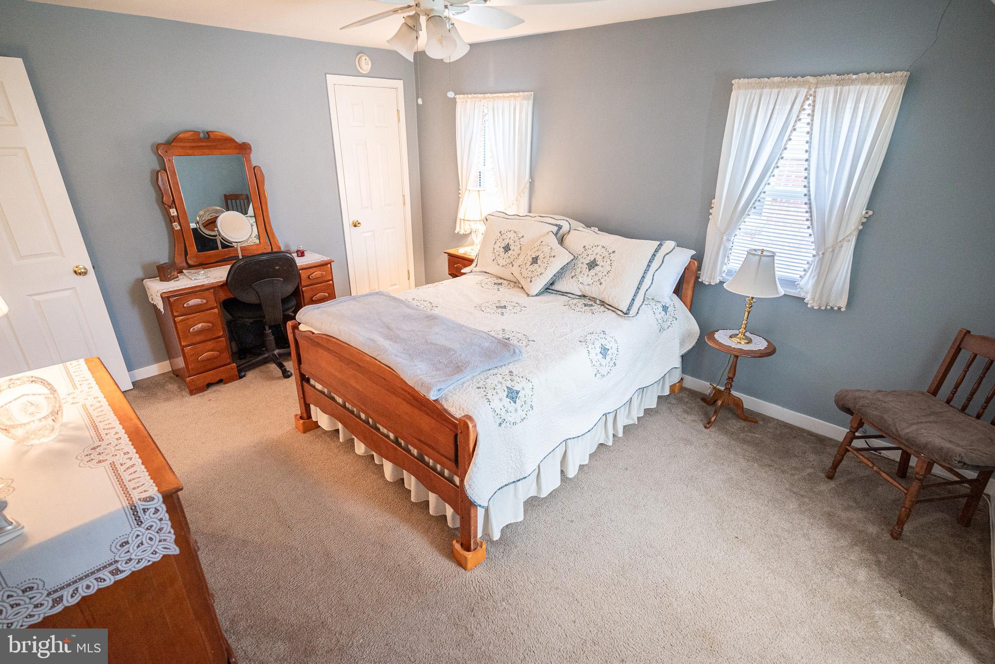 320 Valley View Road Media, PA 19063 - Photo 25 of 34 a bed room with a bed and a chair
