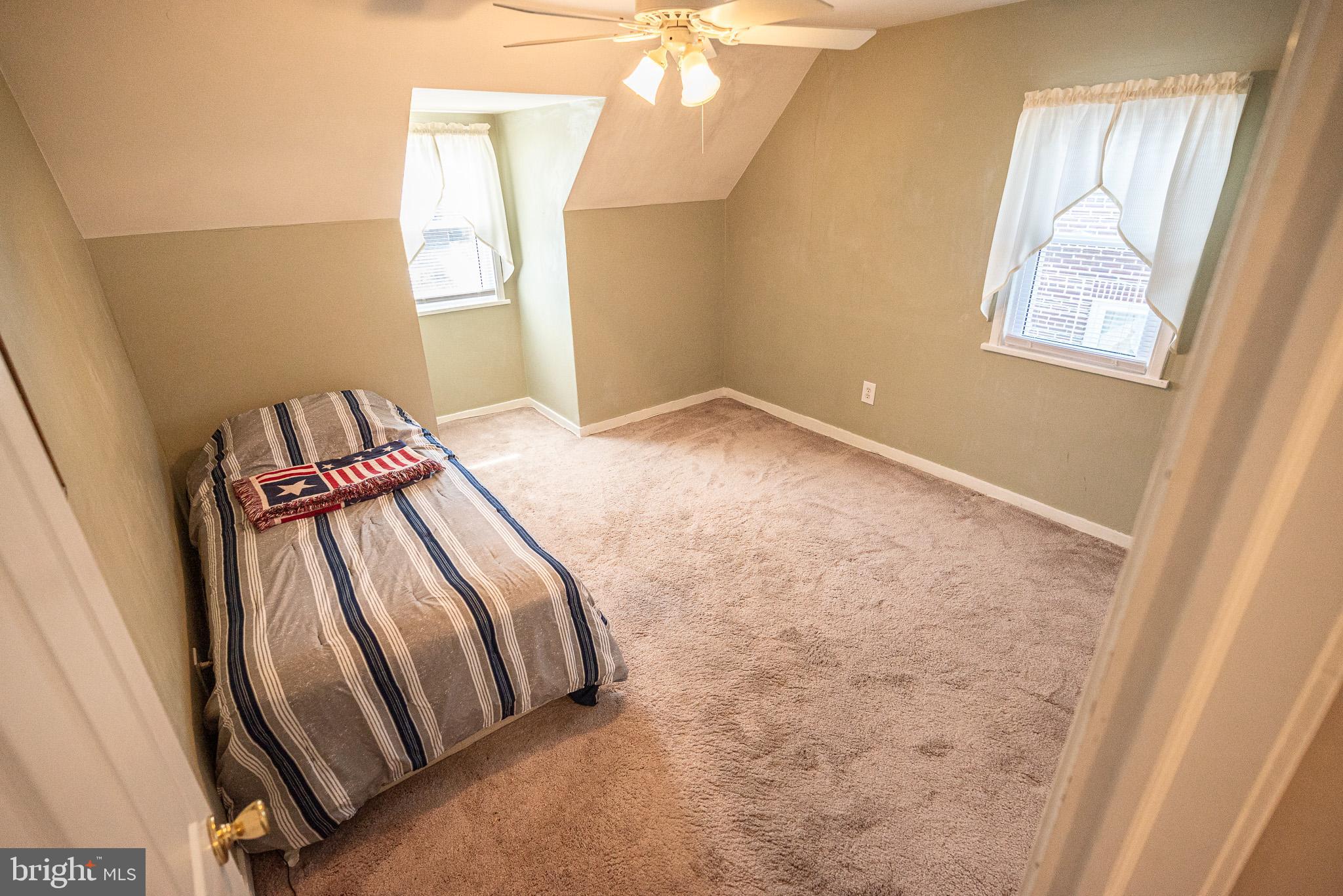 320 Valley View Road Media, PA 19063 - Photo 26 of 34 a view of a room with wooden floor and windows