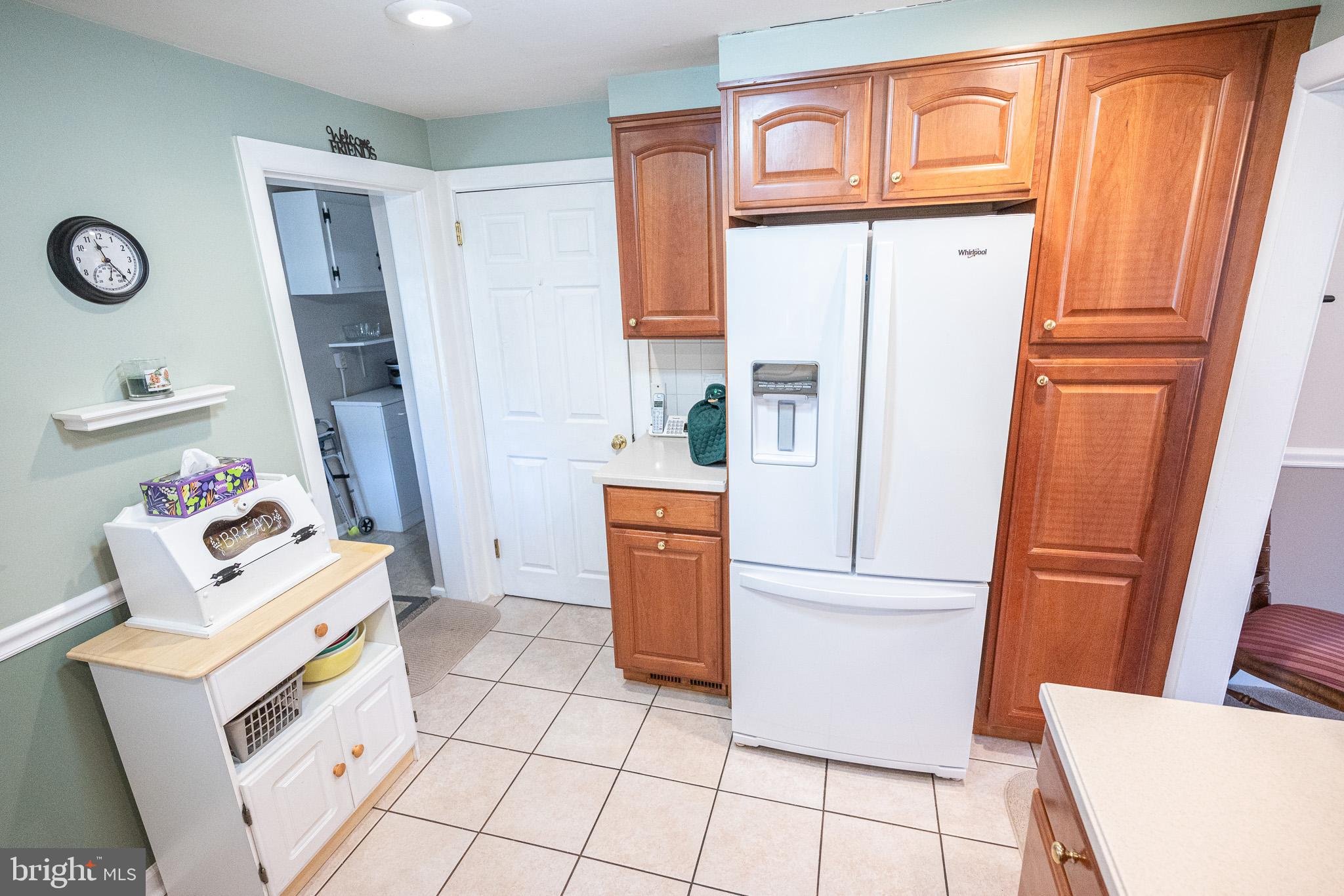 320 Valley View Road Media, PA 19063 - Photo 10 of 34 a kitchen with a refrigerator a stove top oven and a refrigerator