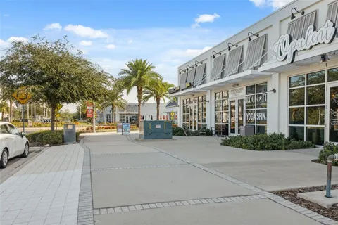 a view of a street with a building in the background