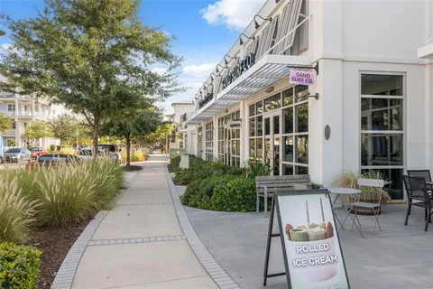 a sign that is on a brick wall