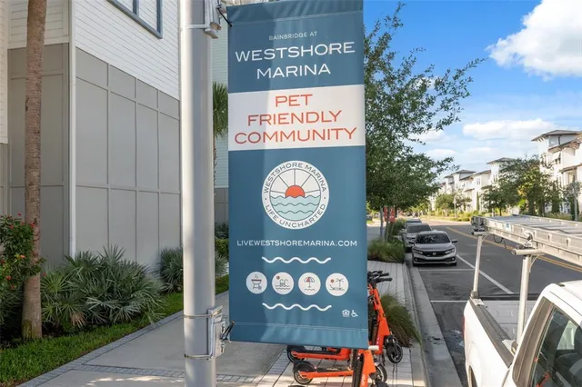 an aerial view of residential houses with city view