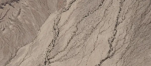 a close up of a white marble wall