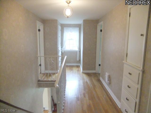 60 Sand Run Road Akron, OH 44313 - Photo 17 of 24 The upstairs hallway features built-ins for extra storage.