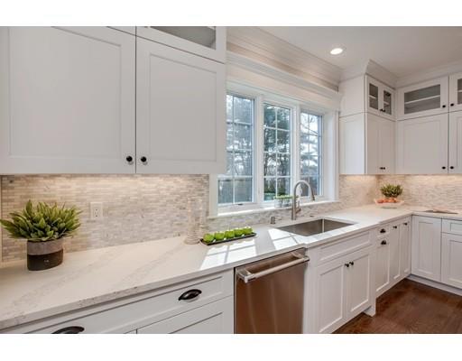 21 Fairhaven Road Newton, MA 02459 - Photo 13 of 30 a kitchen with a sink and cabinets