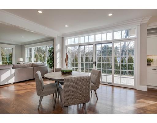21 Fairhaven Road Newton, MA 02459 - Photo 17 of 30 a view of a dining room with furniture window and wooden floor