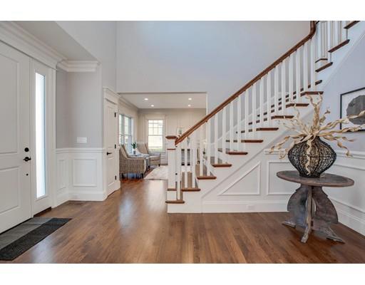 21 Fairhaven Road Newton, MA 02459 - Photo 7 of 30 a view of entryway and hall with wooden floor