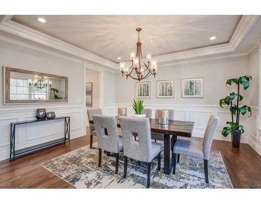 21 Fairhaven Road Newton, MA 02459 - Photo 9 of 30 a view of a dining room with furniture and chandelier
