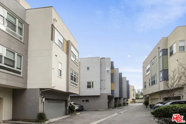 a front view of a building with a street