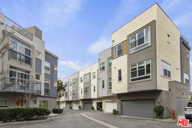 a view of a city with tall buildings