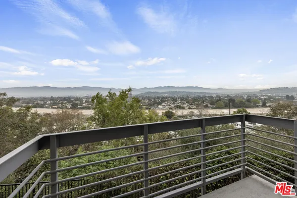 a view of city from a balcony