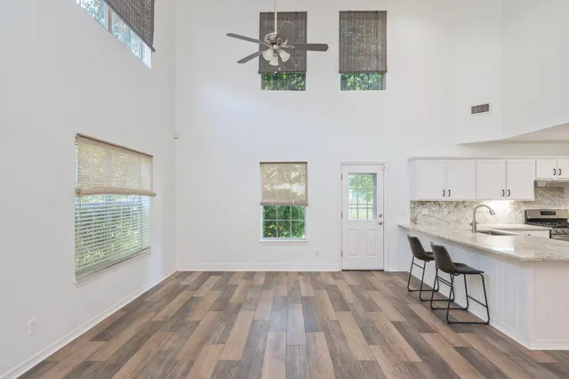 a view of kitchen and windows
