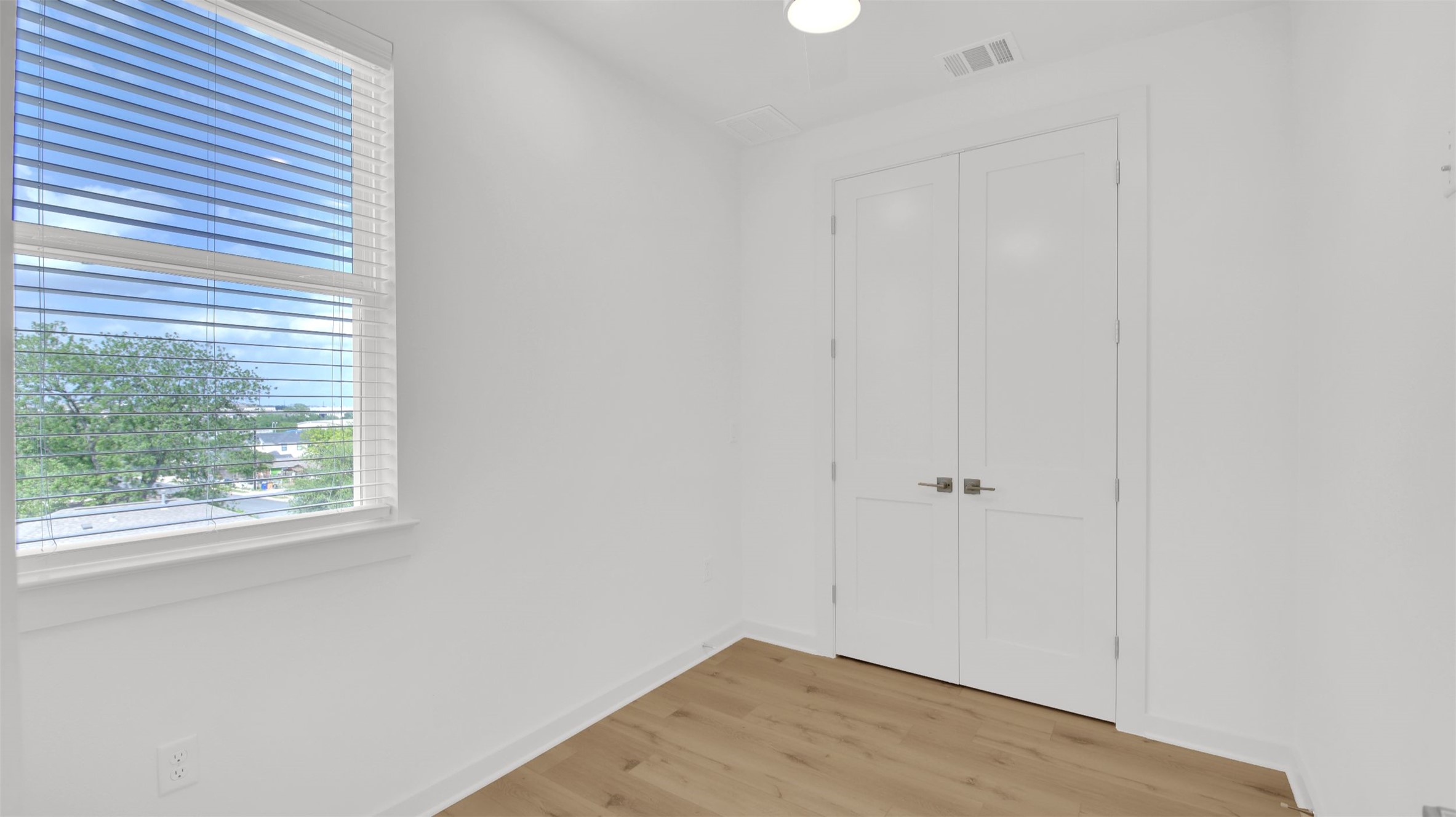 7208 Providence Avenue, Unit 2 Austin, TX 78752 - Photo 14 of 19 an empty room with a window