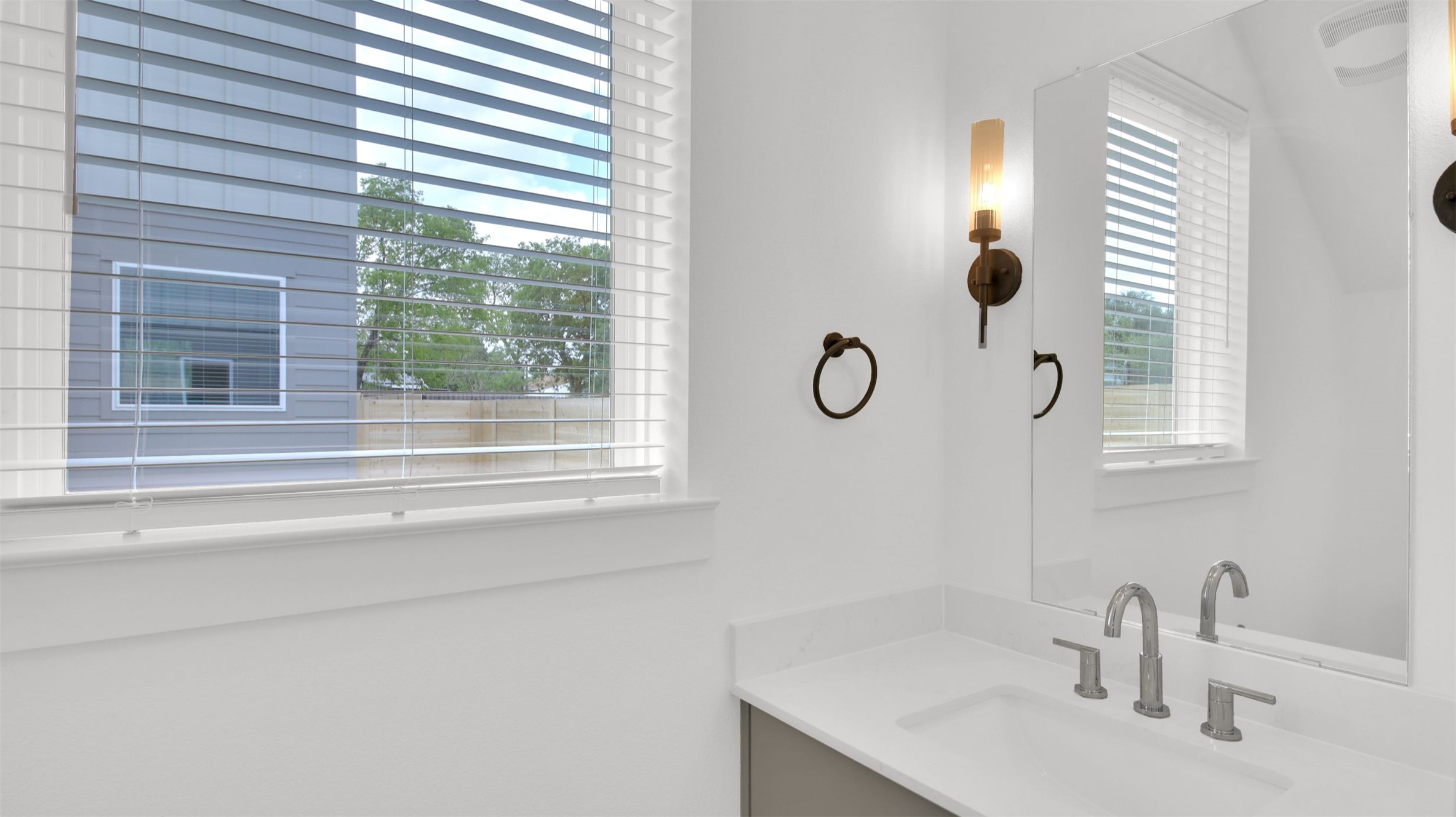 7208 Providence Avenue, Unit 2 Austin, TX 78752 - Photo 4 of 19 a bathroom with a sink and a window