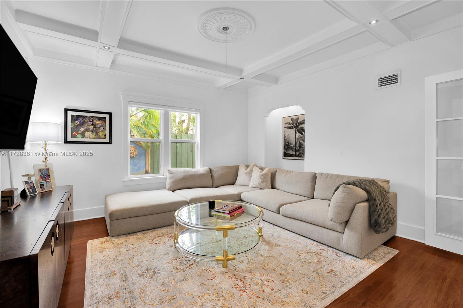 178 Northeast 45th Street Miami, FL 33137 - Photo 11 of 47 a living room with furniture and a window