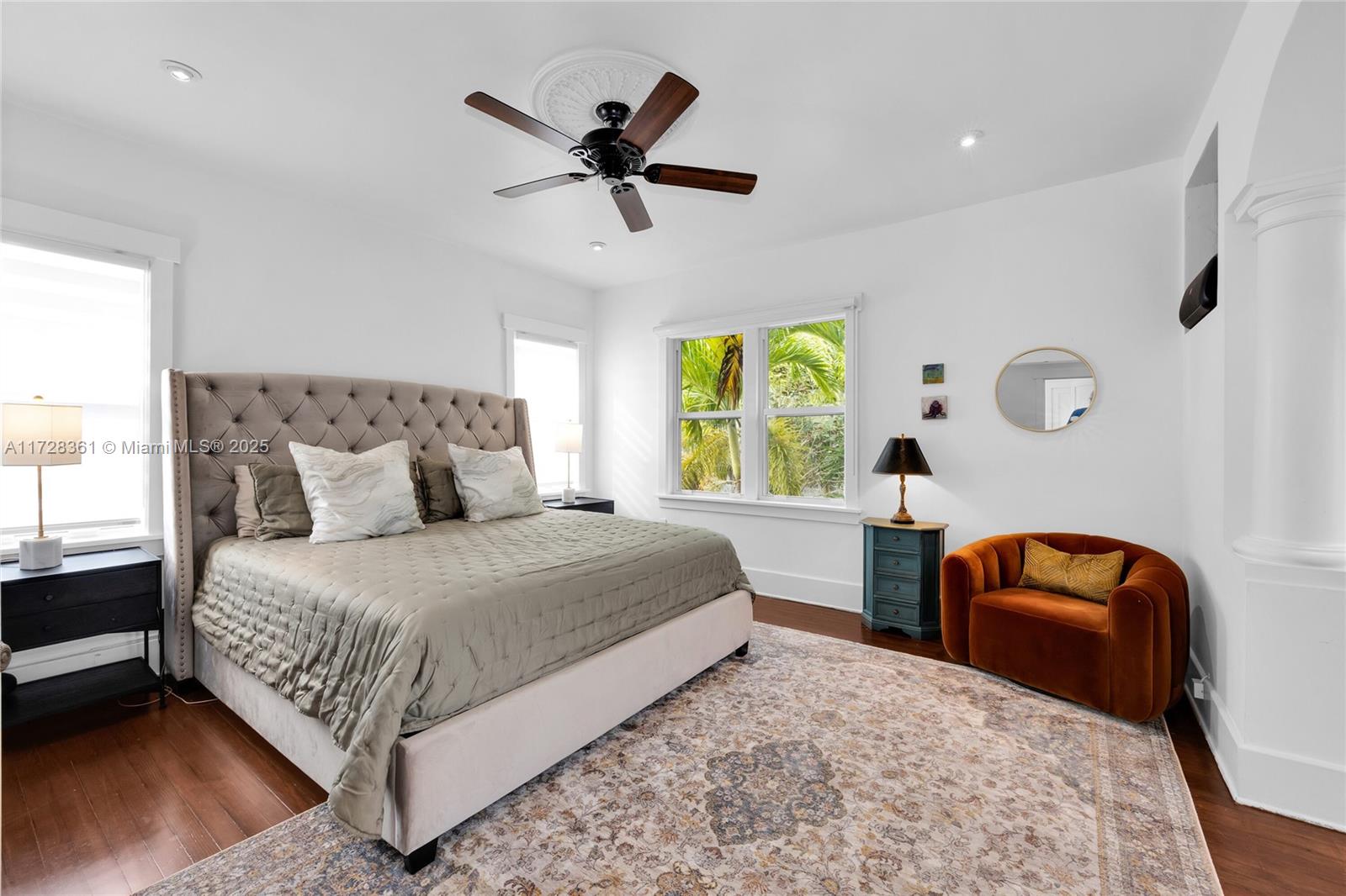 178 Northeast 45th Street Miami, FL 33137 - Photo 18 of 47 a bedroom with a bed and window