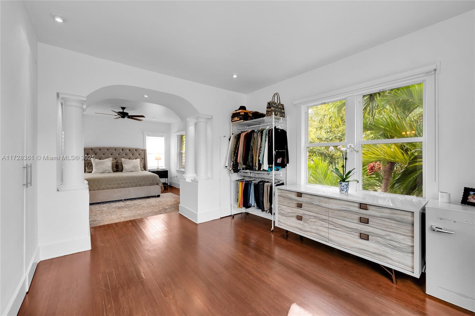178 Northeast 45th Street Miami, FL 33137 - Photo 23 of 47 a living room with furniture and a flat screen tv