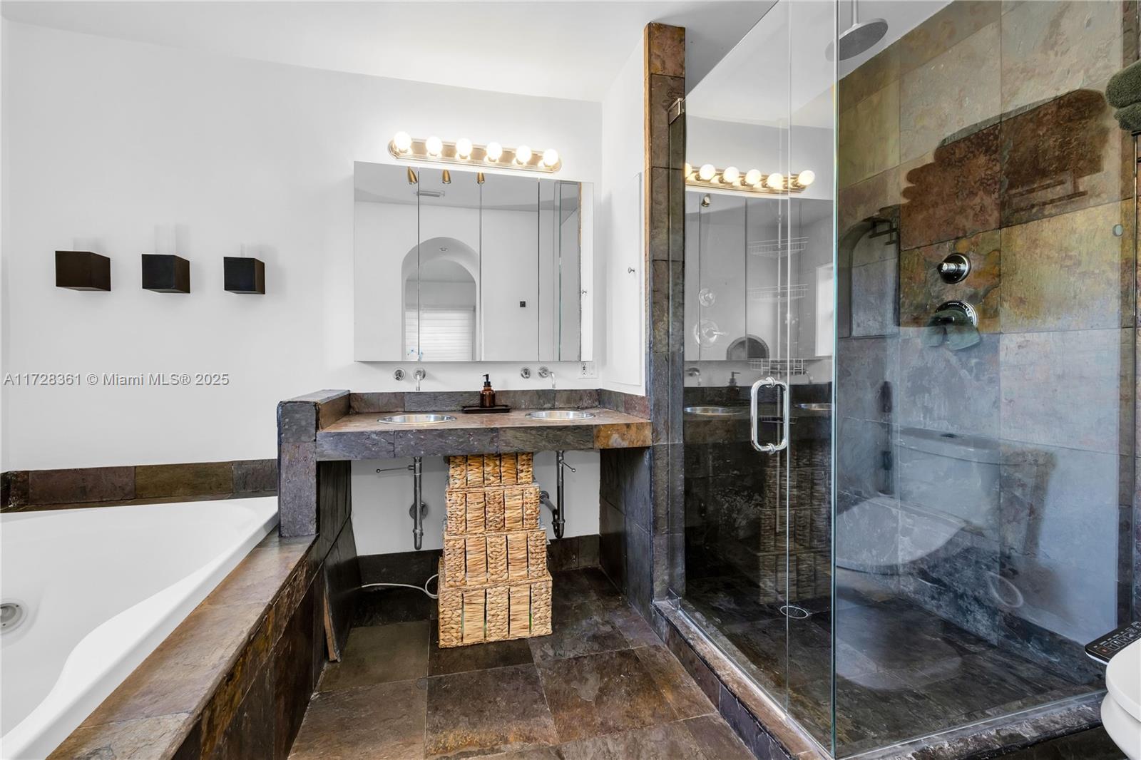 178 Northeast 45th Street Miami, FL 33137 - Photo 25 of 47 a bathroom with a sink a toilet and shower