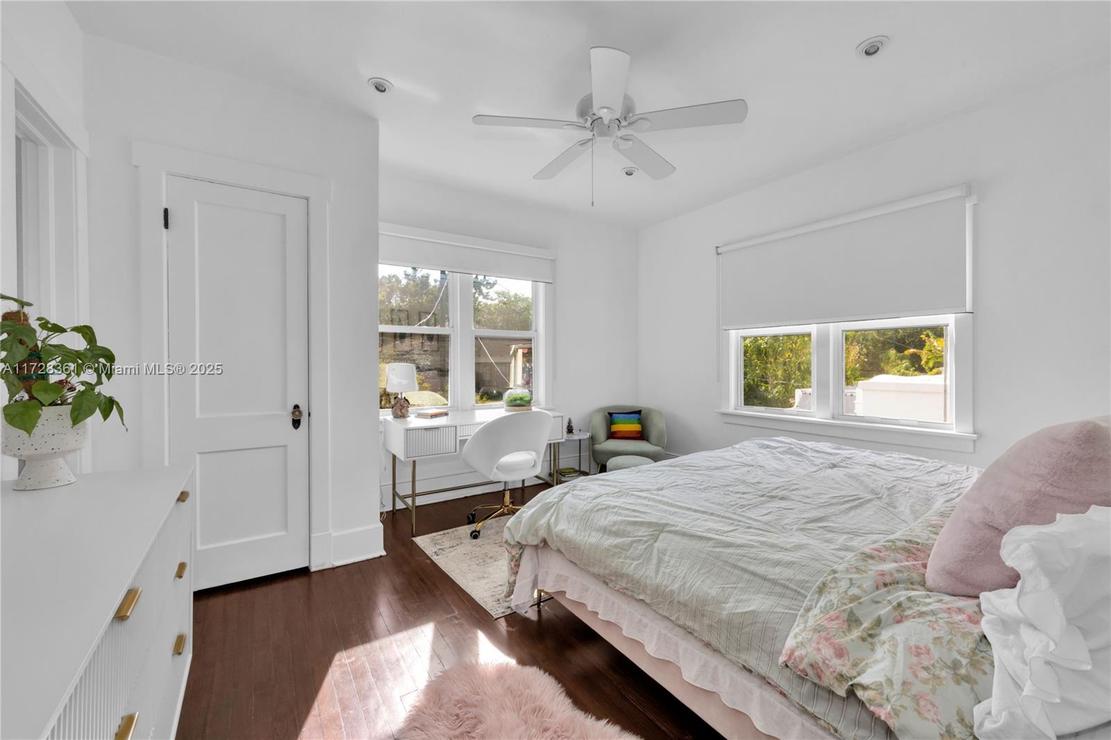 178 Northeast 45th Street Miami, FL 33137 - Photo 29 of 47 a bed room with a bed and a window