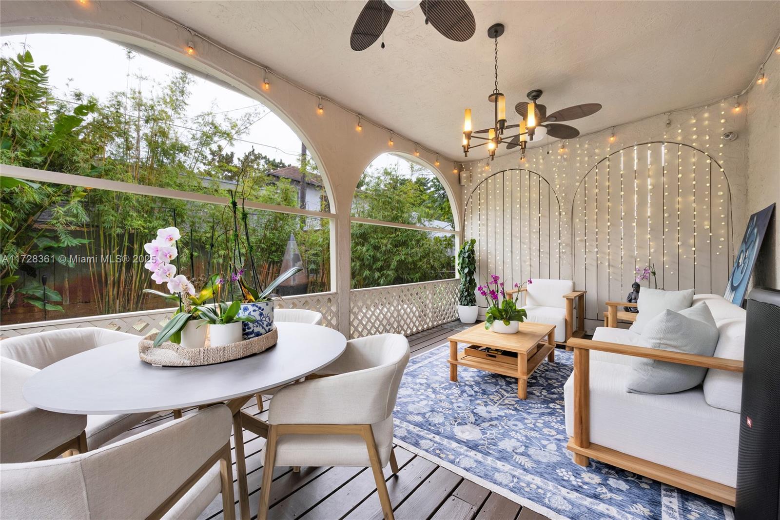 178 Northeast 45th Street Miami, FL 33137 - Photo 30 of 47 a living room with furniture and a large window