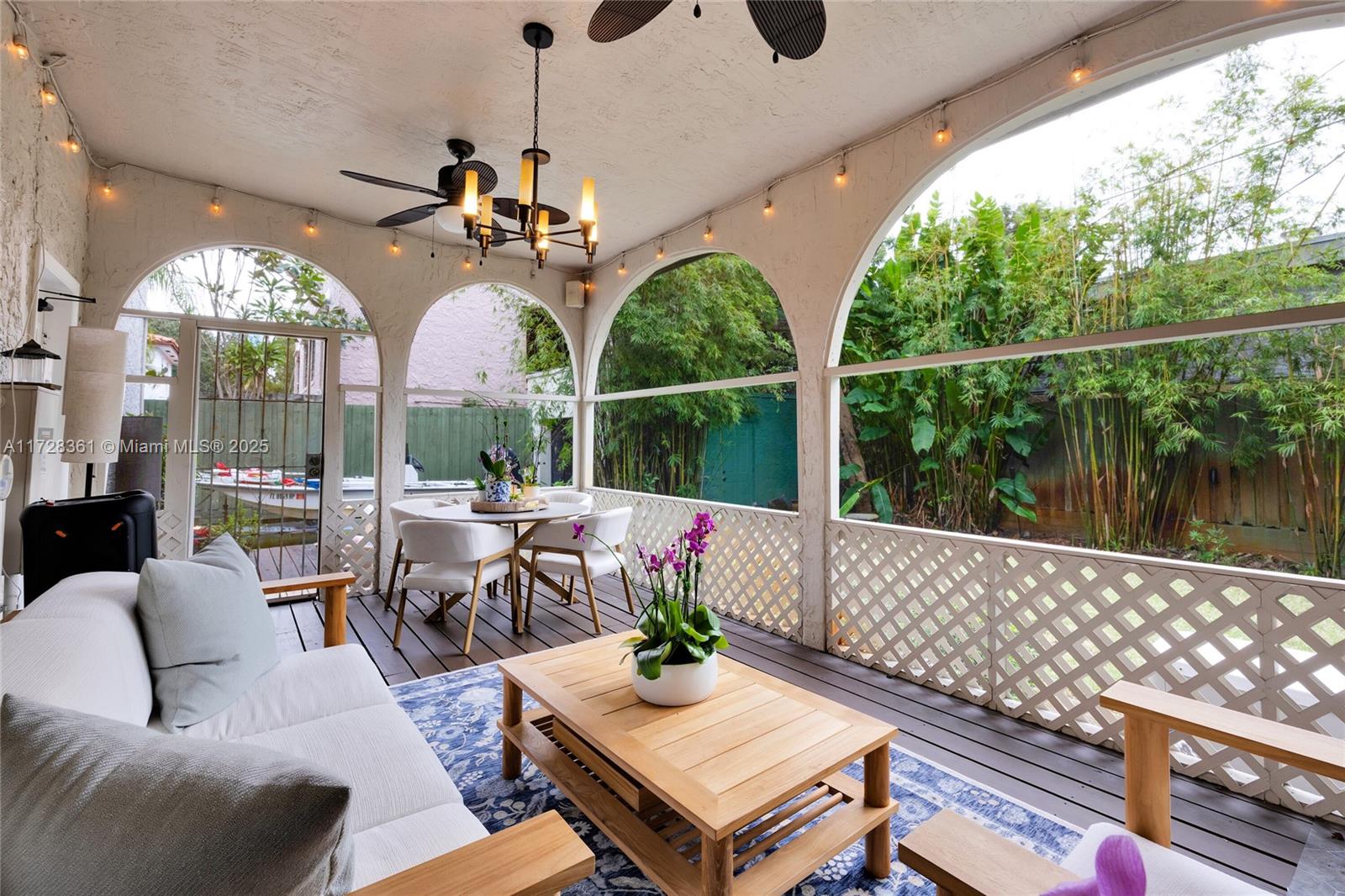 178 Northeast 45th Street Miami, FL 33137 - Photo 31 of 47 a living room with furniture and a large window