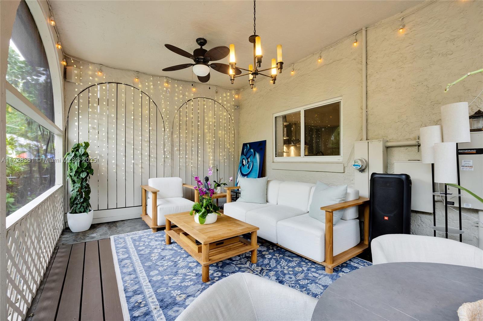 178 Northeast 45th Street Miami, FL 33137 - Photo 32 of 47 a living room with furniture and wooden floor