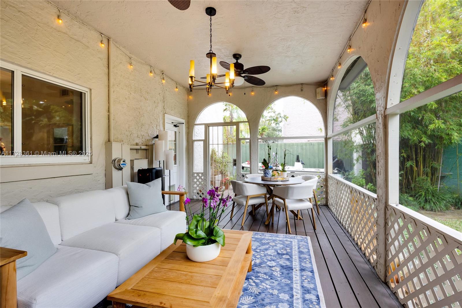178 Northeast 45th Street Miami, FL 33137 - Photo 33 of 47 a view of a dining room with furniture window and wooden floor