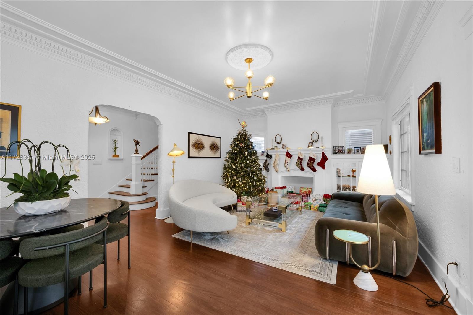 178 Northeast 45th Street Miami, FL 33137 - Photo 4 of 47 a living room with furniture and a wooden floor