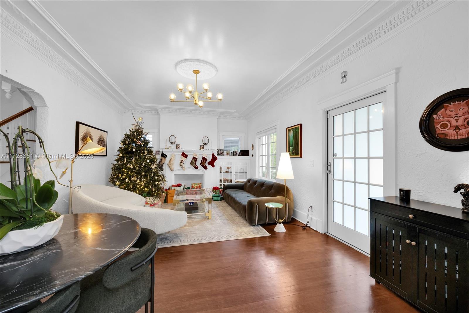 178 Northeast 45th Street Miami, FL 33137 - Photo 5 of 47 a living room with furniture and a table