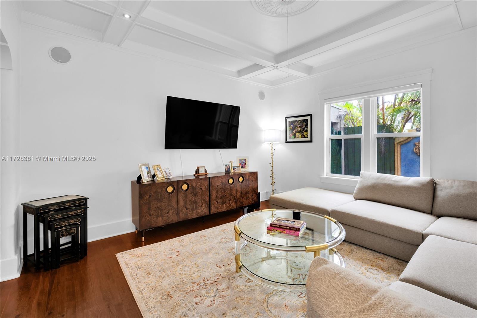 178 Northeast 45th Street Miami, FL 33137 - Photo 10 of 47 a living room with furniture and a flat screen tv