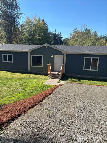 an aerial view of residential house with outdoor space