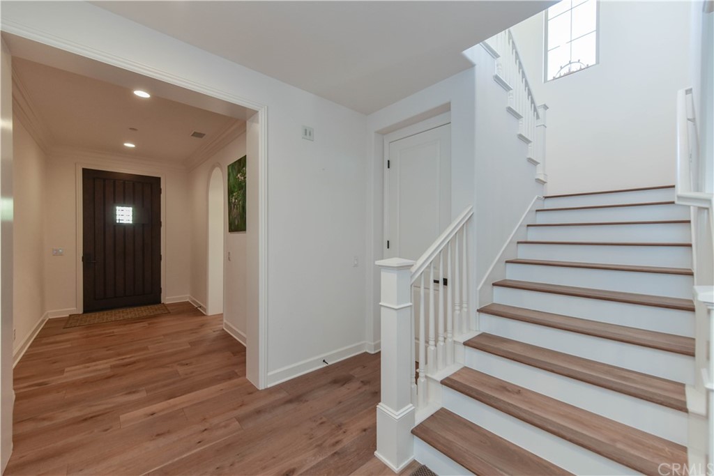 71 Sunset Cove Irvine, CA 92602 - Photo 18 of 55 a view of entryway with wooden floor