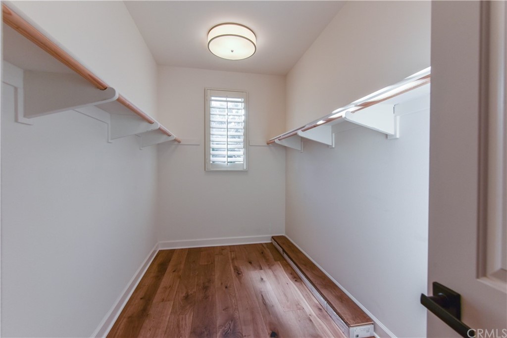 71 Sunset Cove Irvine, CA 92602 - Photo 31 of 55 a view of empty room with wooden floor and fan