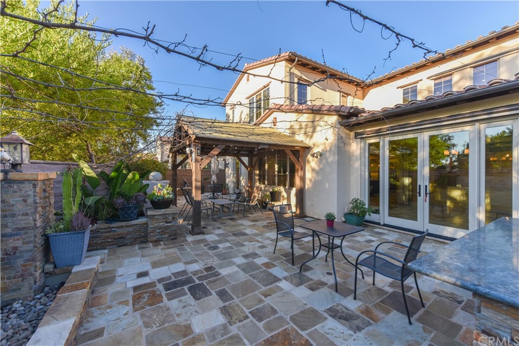 71 Sunset Cove Irvine, CA 92602 - Photo 49 of 55 a view of a chairs and table in the patio