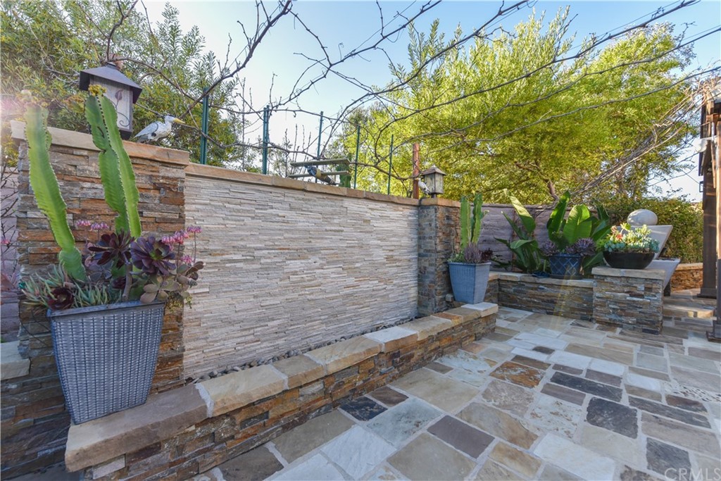 71 Sunset Cove Irvine, CA 92602 - Photo 51 of 55 a view of a backyard with sitting area